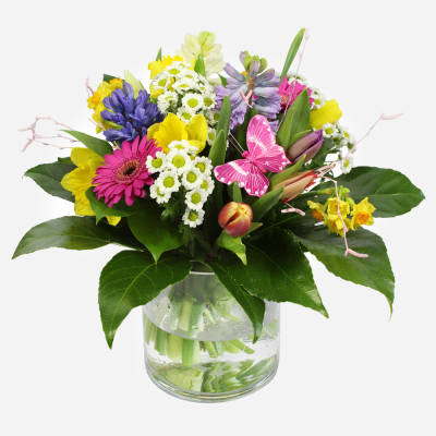 You're Wonderful - A spring hand tied in a glass vase in a lovely mix of flowers and colours.
